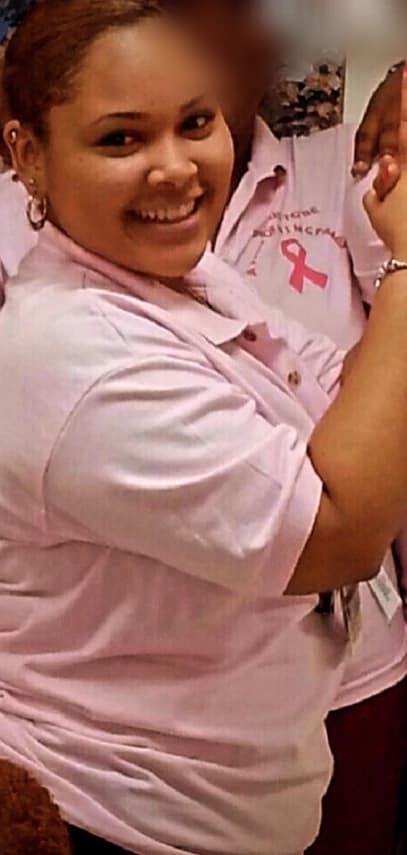 Before: a smiling client in a pink shirt